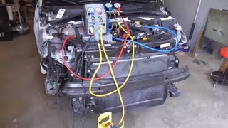 How to recover R134a refrigerant from a car [upl. by Ylicis298]