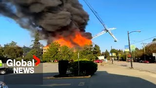 Massive fire in Vancouver brings down crane destroys home [upl. by Kimberley69]