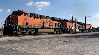 BNSF 4254 west leads a sizable trackage rights freight past sunset station [upl. by Ennaerb]