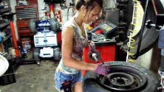 ASIAN LADY CHANGING TIRES AT TIRE SHOP IN FLORIDA [upl. by Coffee]