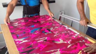 Triming wallcovering on the table [upl. by Amaso357]