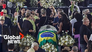 quotGreatest person in the worldquot Peles coffin carried into Santos soccer stadium for wake [upl. by Tann]