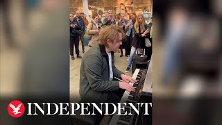 Lewis Capaldi surprises commuters by singing in London station [upl. by Eniarrol740]