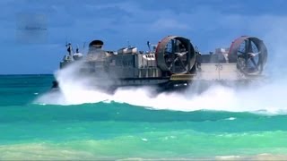 US Navy LCAC Hovercraft Land on Beach Unload Equipment Return to Aircraft Carrier [upl. by Ahtamas433]