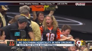 Saints fan swipes ball from Bengals fan [upl. by Darton]