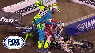 Riders fight after crash at Supercross event  FOX SPORTS [upl. by Wolliw420]