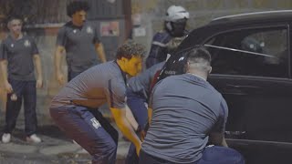 Italian rugby team lift a car out the way for team bus to get through  Facing Goliath [upl. by Elleynad]