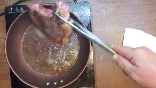 Cooking Frozen steak on hot skillet [upl. by Fleeta621]