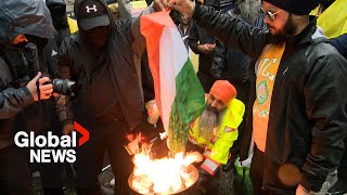 Sikh protesters burn Indian flag outside consulates in Canada over Nijjar murder [upl. by Yelsna655]