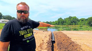 Installing an Overflow Pipe in a Pond Dam [upl. by Enileuqkcaj]