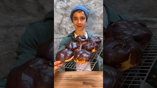 Bossche bol  Dutch classics episode 27 dutchfood dutchclassics bosschebol moorkop recipe food [upl. by Ahsitahs731]