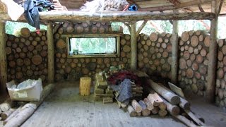 off grid roundhouse build part 20 solar panels cordwood walls garden update [upl. by Beitris]