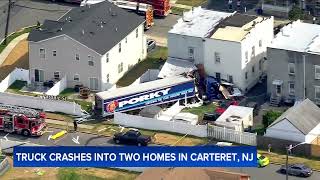 Truck crashes into 2 homes in Carteret NJ after driver suffers medical episode [upl. by Oralie409]