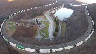 Aerial Video  Horseshoe Curve Altoona PA  Norfolk Southern Train Approaching [upl. by Minsat]