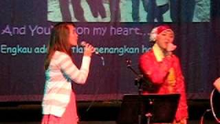 Sari amp Marina singing Indonesian song quotKemenangan Hatiquot [upl. by Helbon658]