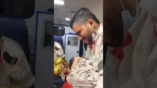 Gaza emergency worker breaks down in tears while cradling baby shorts [upl. by Leummas703]