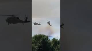 Two fire crew helicopters came perilously close [upl. by Arammat]