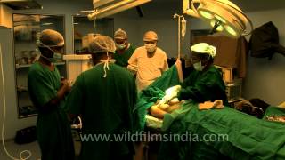 Surgeons preparing for Fibrocystic breast surgery [upl. by Jarvey]