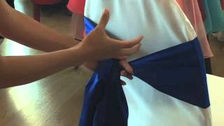 How to tie a satin chair cover bow [upl. by Yanahc543]