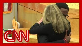 See victims brother hug convicted excop Amber Guyger [upl. by Stephani]