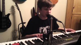 Child plays piano and sings Reeses Puff Commercial [upl. by Arhna]