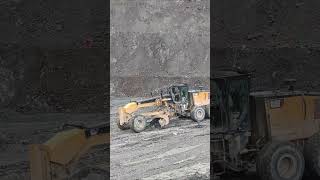 Construction Machine in Action Clearing Some Mud With CAT 18M3 Motor Grader [upl. by Lajib202]