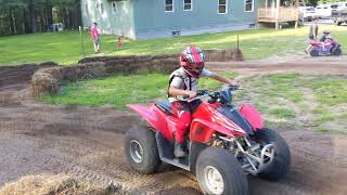 Yamaha Moto 4 80 Honda TRX90 Honda TRX90X and CanAm Renegade 110 XXC making laps on home track [upl. by Karolyn8]