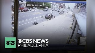 Surveillance video of shooting after car hitting motor scooter in Kensington Philadelphia [upl. by Kristopher]