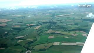 Aerial view of flight flying over the Cerne Abbas giant Dorset [upl. by Assirahc]