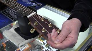 Restringing a steel string acoustic guitar [upl. by Anjela380]