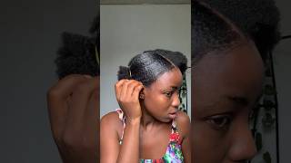 How to sleek bun short natural hair with just two products naturalhairstyling youtubeshorts howto [upl. by Ekul947]