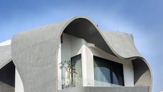 Studio Ardete ‘dresses’ Ribbon House with undulating concrete [upl. by Zerdna883]