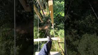 Man crosses rotating steps on high bridge in Foshan China [upl. by Eseilanna]