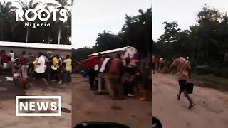 Residents Of Cross River State Scoop Fuel from Fallen Tanker [upl. by Yllor595]