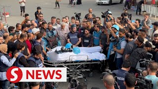 Colleagues bid farewell to two journalists killed in IsraelPalestine conflict [upl. by Doughman]