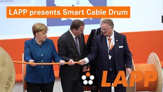 LAPP presents Smart Cable Drum to Angela Merkel and Stefan Löfven [upl. by Priscella]