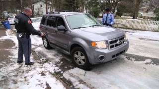 Raleigh police help stuck motorist up icy hill [upl. by Aronid464]