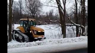 Grooming snowmobile trail with Cat Challenger 1 [upl. by Arreic252]