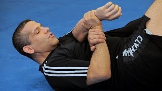 How to Do a Traditional Kimura from Guard  MMA Submissions [upl. by Yrrum659]