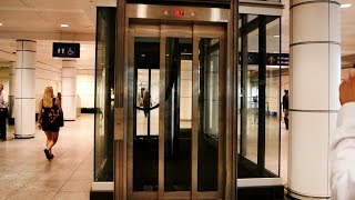 Epic Priceless amp Amazing inground hydraulic glass elevators  Montreal Trudeau Airport YUL [upl. by Amadus]