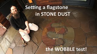 setting a flagstone in STONE DUST so it stays stable underfoot [upl. by Thorpe56]