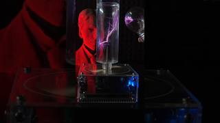 Bulb Ignites in Jar from Tesla Coil [upl. by Aihsyn374]